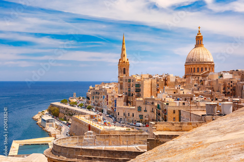 View from above of roofs and church of Our Lady of Mount Carmel and St. Paul's Anglican Pro-Cathedral, Valletta, Capital city of Malta