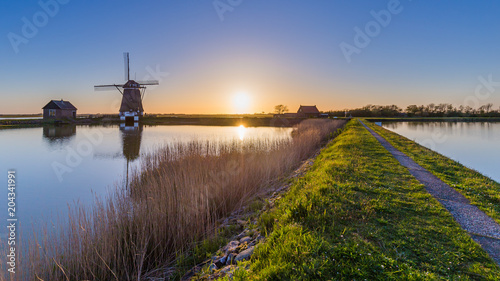 Dutch windmill Het Noorden during Sunset on the island Texel in the Netherlands