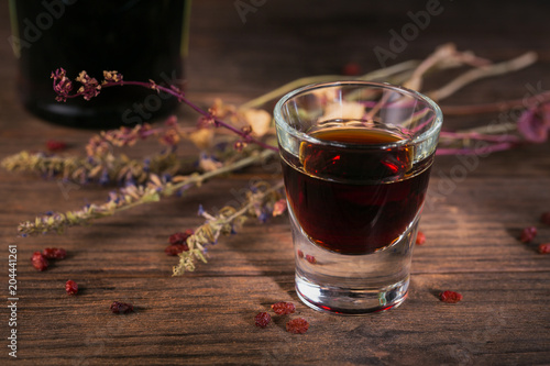 Herbal bitter liqueur with different natural ingredients.