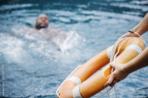 Man being rescued from the water