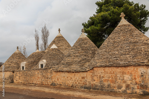 Italy, SE Italy, Region of Apulia, Province of Bari, Itria Valley, Alberobello. A trullo house is a Apulian dry stone hut with a conical roof. UNESCO Heritage site.