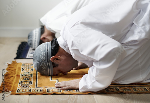Muslim men praying during Ramadan