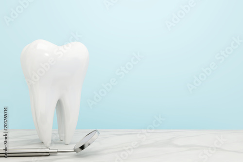 Tooth and Dentist mirror on pastel blue background.