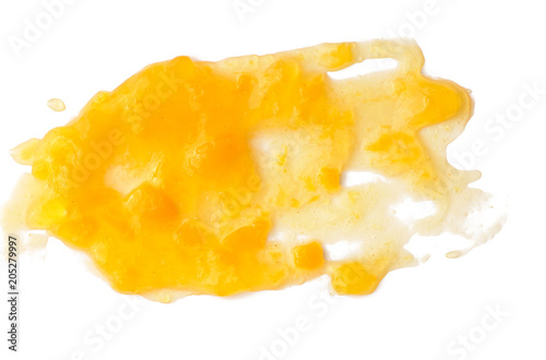 Apricot jam spread isolated over white background