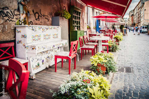 Lviv outdoor cafe with red umbrellas