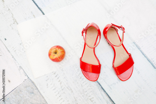 Red sandals and apple