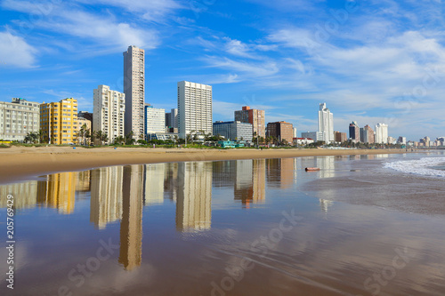 Reflection of Durban "Golden Mile" beachfront in the Indian Ocean, KwaZulu-Natal province of South Africa