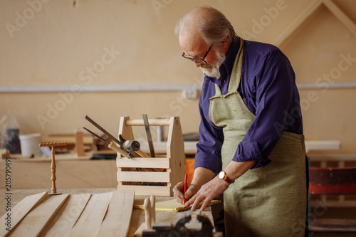 measure thrice and cut once. elderly male is earning money for leaving