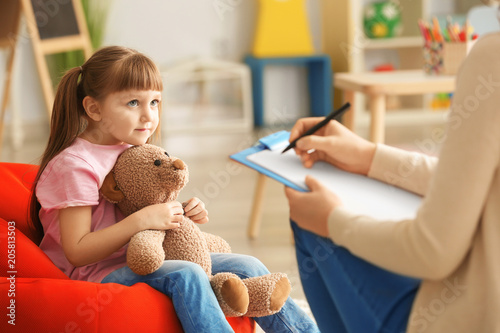 Cute little girl at child psychologist's office