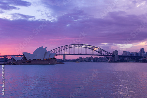 opera house and harbour bridge in Sydney at sun clouds in twilight time,They are iconic landmarks of Australia .Australia