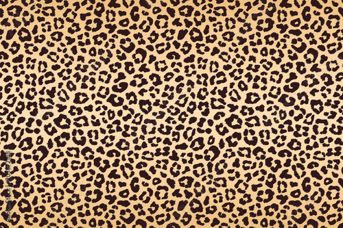 Leopard beige brown spotted fur texture. Vector