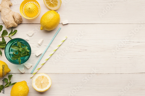 Making lemonade at home, ingredients on white wooden table