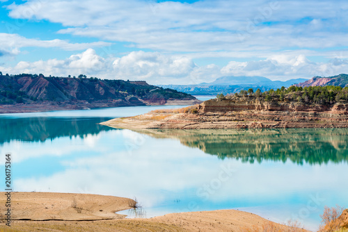 View from the coast of the "El Negratín" water reservoir, in Baza, Granada Province. This is the 3rd biggest water reservoir in Spain.