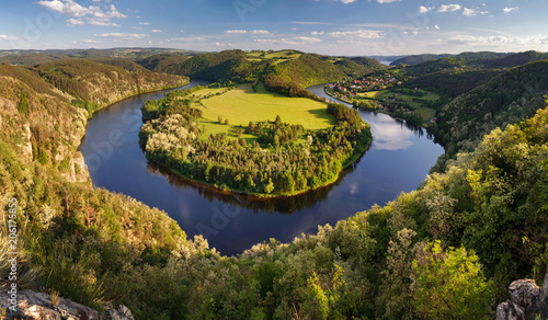 River canyon with dark blue water and spring colorful forest. Horseshoe bend, Vltava river, Czech republic. Beautiful landscape with river. Solenice lookout.