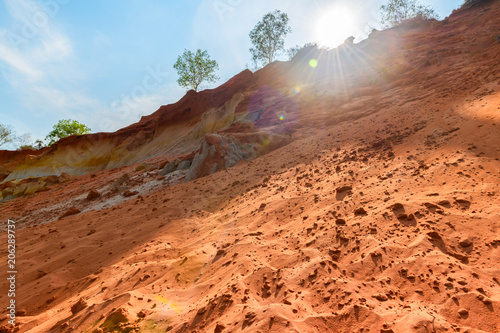 Red dune and red sand pattern with sunlight at Fairy Stream.