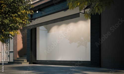 Blank shop window in the night street with light on the frame. 3d rendering