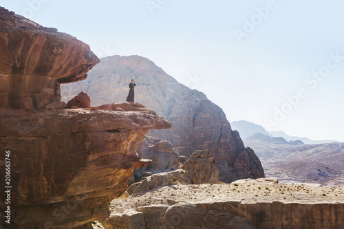 Girl in old city Petra in the desert of Wadi Musa in Jordan, a UNESCO world heritage valley
