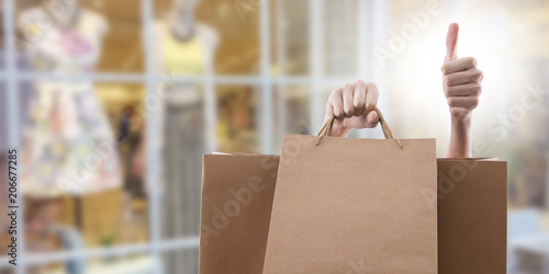 shopping bags with sign of satisfaction and okay