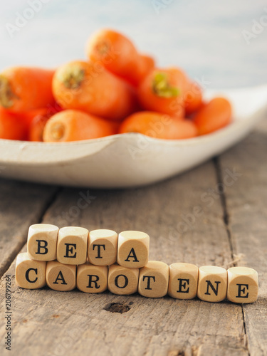 Beta carotene on wooden dices