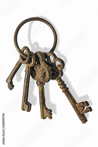 Bunch of old keys isolated on white background