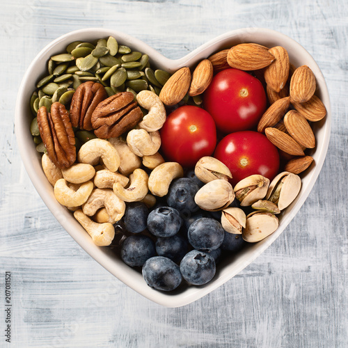 Healthy snack in heart shaped bowl