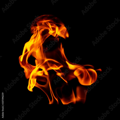 Red flame of fire on a black background