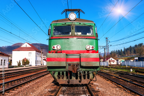 old electric locomotive on rails