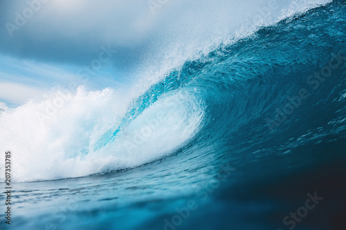 Ocean barrel wave in ocean. Breaking wave for surfing in Bali