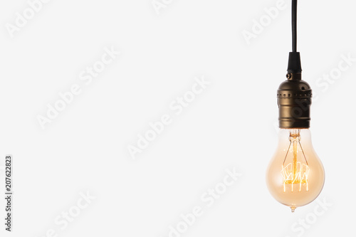 Edison light bulb on white background. space for text
