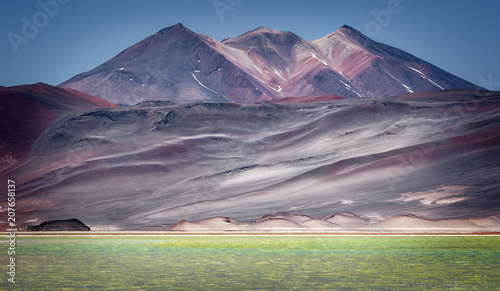 Caichinque volcano from Salar de Talar, near Aguas Calientes, in the Antofagasta region, the northern limit of the Puna of Atacama, San Pedro de Atacama, Chile