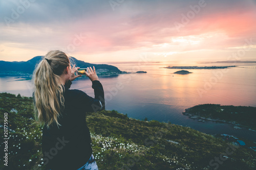 Tourist take a photo of beautful nordic landscape.