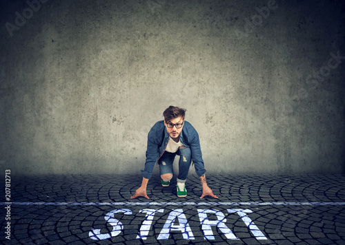 young man in the starting position