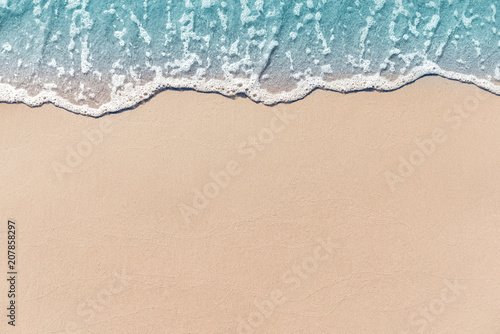 Close up soft wave lapped the sandy beach, Summer Background.