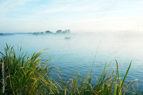 morning fishing on a misty lake