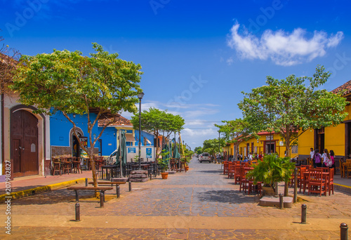 GRANADA, NICARAGUA - APRIL 28, 2016: View of market stalls at a colorful street in Granada, Nicaragua