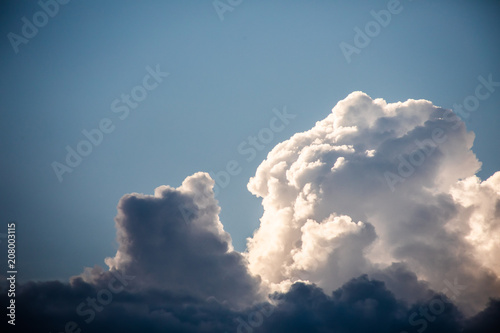 Close-up of cumulus clouds forming with silver lining