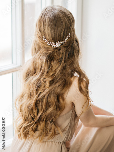 Young woman with beautiful hairstyle