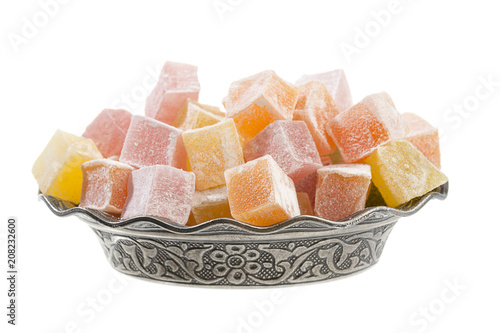 Turkish delight in vintage plate isolated on white background.