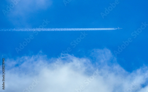 blue cloudy with sky vapour trails
