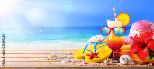 Beach Concept - Tequila Sunrise Cocktail With Summer Accessories 