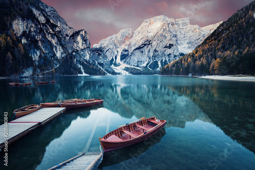 Wooden boat at the alpine mountain lake