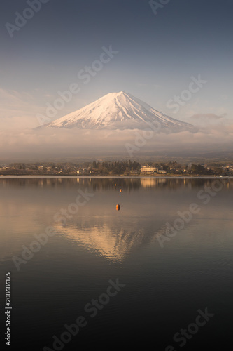 Mountain Fuji and Lake Tanumi with beautiful sunrise in winter season. Lake Tanuki is a lake near Mount Fuji, Japan. 