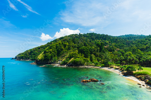 Summer seascape view with clear sea, green forest and blue sky on koh Lanta island in Thailand.