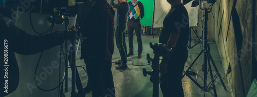 actor in studio posing on green screen