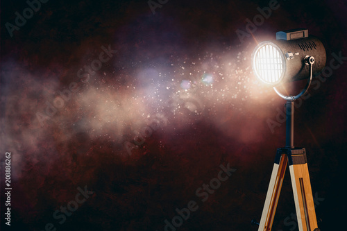 3d stage spot light with smoke on black background