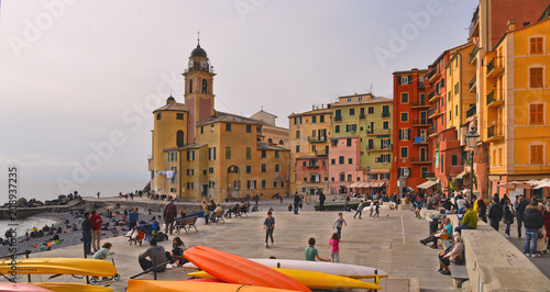 colorful buildings church and architecture on the beach in Camogli liguria, nothern italy