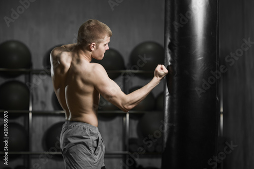 fighter training with a punching bag