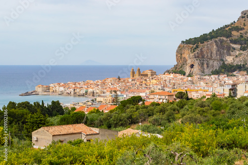 View of the city of Cefalu, its basilica and its rock