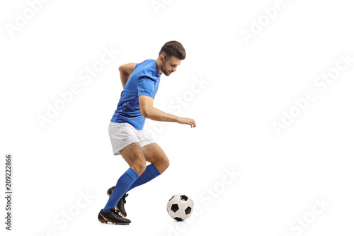 Soccer player dribbling