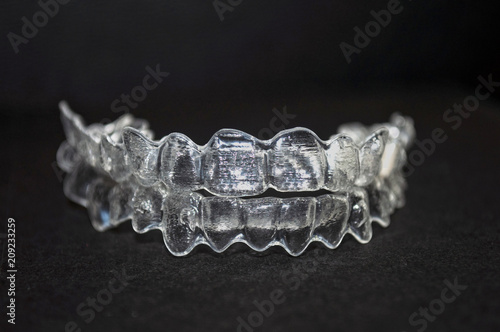 Invisalign. Invisible mobile braces aligner for orthodontic appliance. Dental correction. Dental orthodontic silicone trainer printed in 3d. Invisible braces aligner.